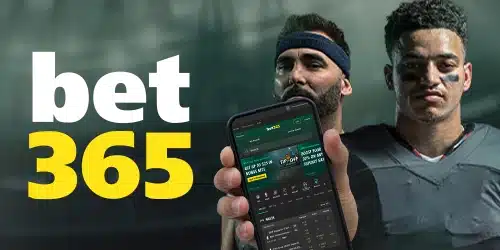 Advertisement for bet365, showing three people, possibly athletes. The central figure holds a smartphone displaying the bet365 app. Visible app elements include the bet365 logo, betting odds, and promotional offers. The bet365 logo is also prominently displayed on the left